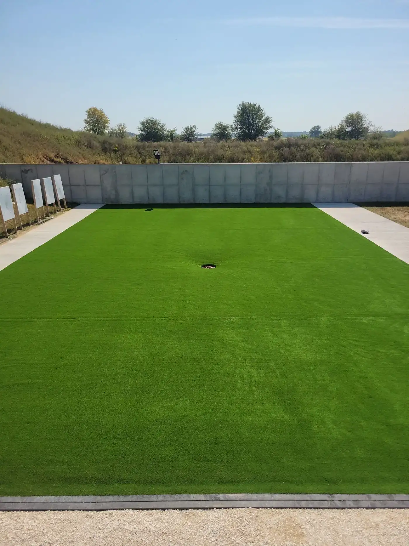 Artificial turf putting area between houses