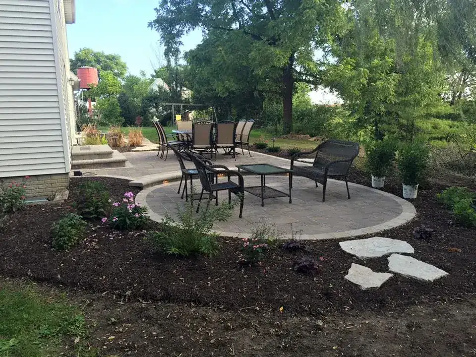 Finished round patio with chairs and stepping stones
